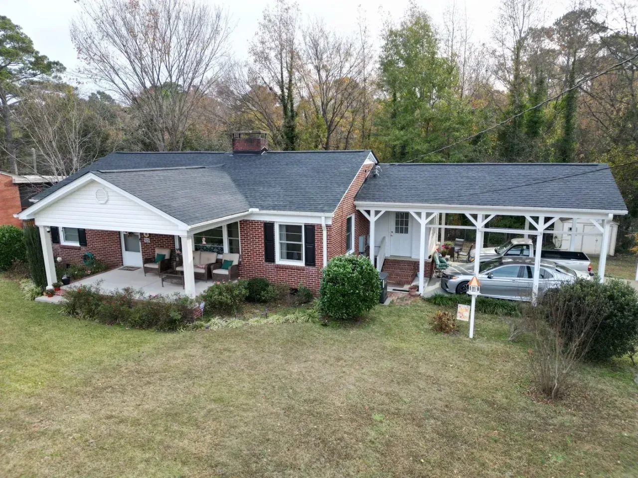 Completed roof replacement with Charcoal GAF Timberline Natural Shadow shingles on 3rd St in Lillington, NC