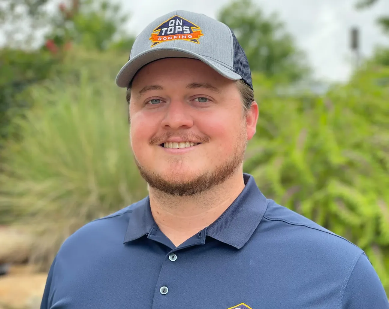 Portrait of Josh Moore, Area Sales Manager at On Tops Roofing