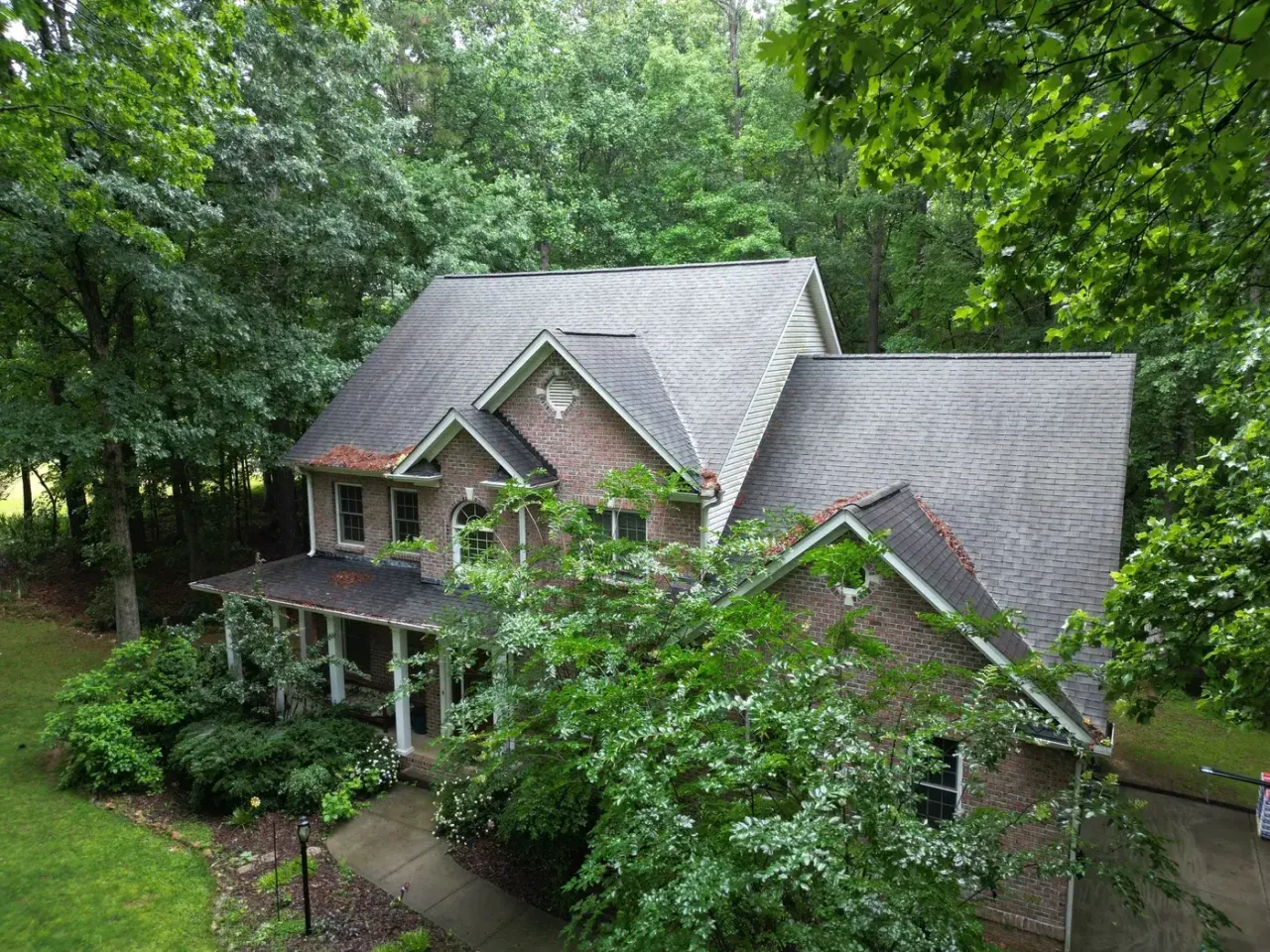 Roof on Benning Cir in Clayton, NC before the roof replacement