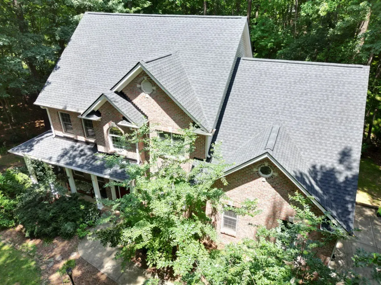 Completed roof replacement with Charcoal GAF Timberline HDZ shingles on Benning Cir in Clayton, NC