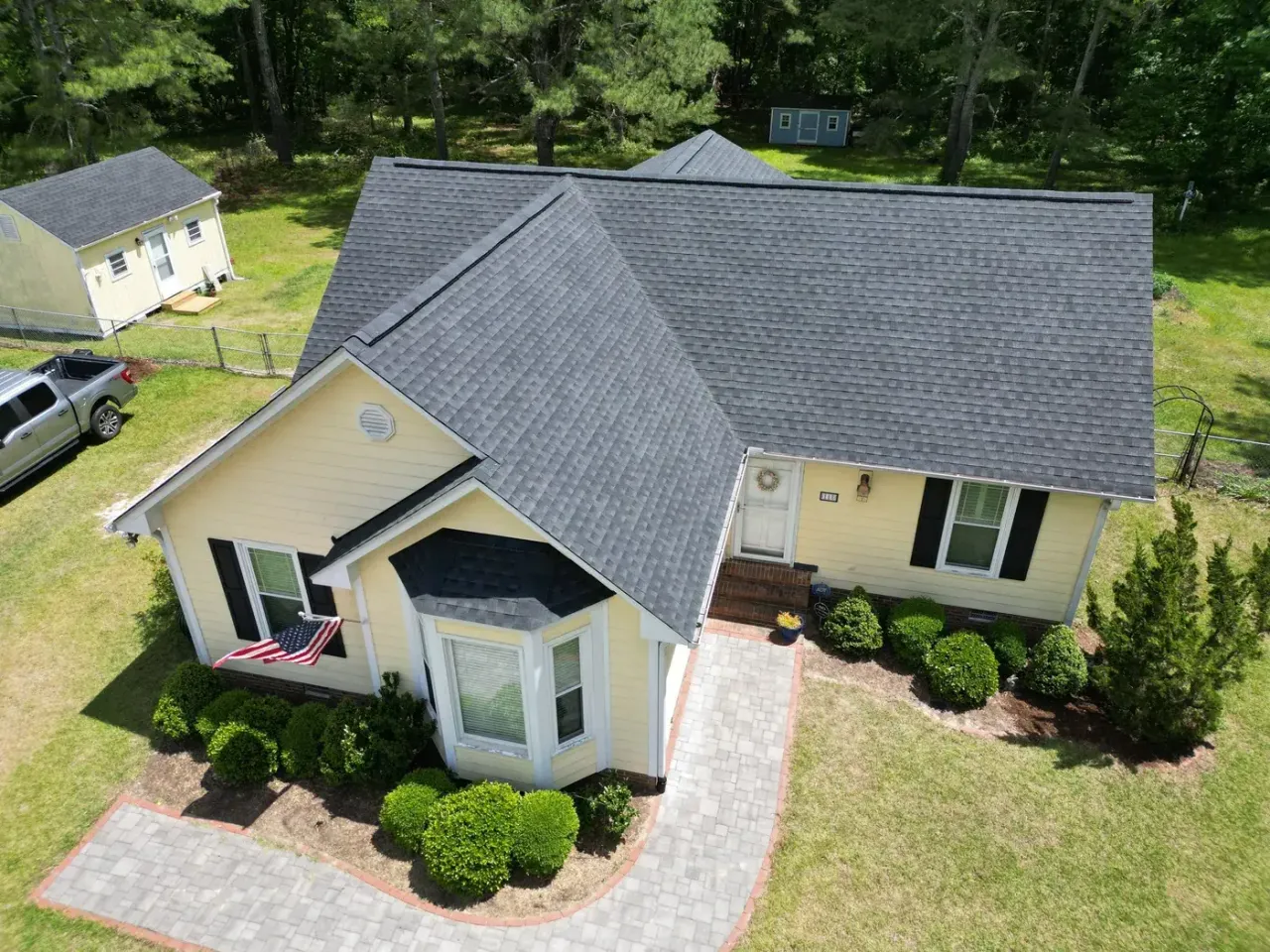 Completed roof replacement with Charcoal GAF Timberline HDZ shingles on Benton Place Dr in Angier, NC