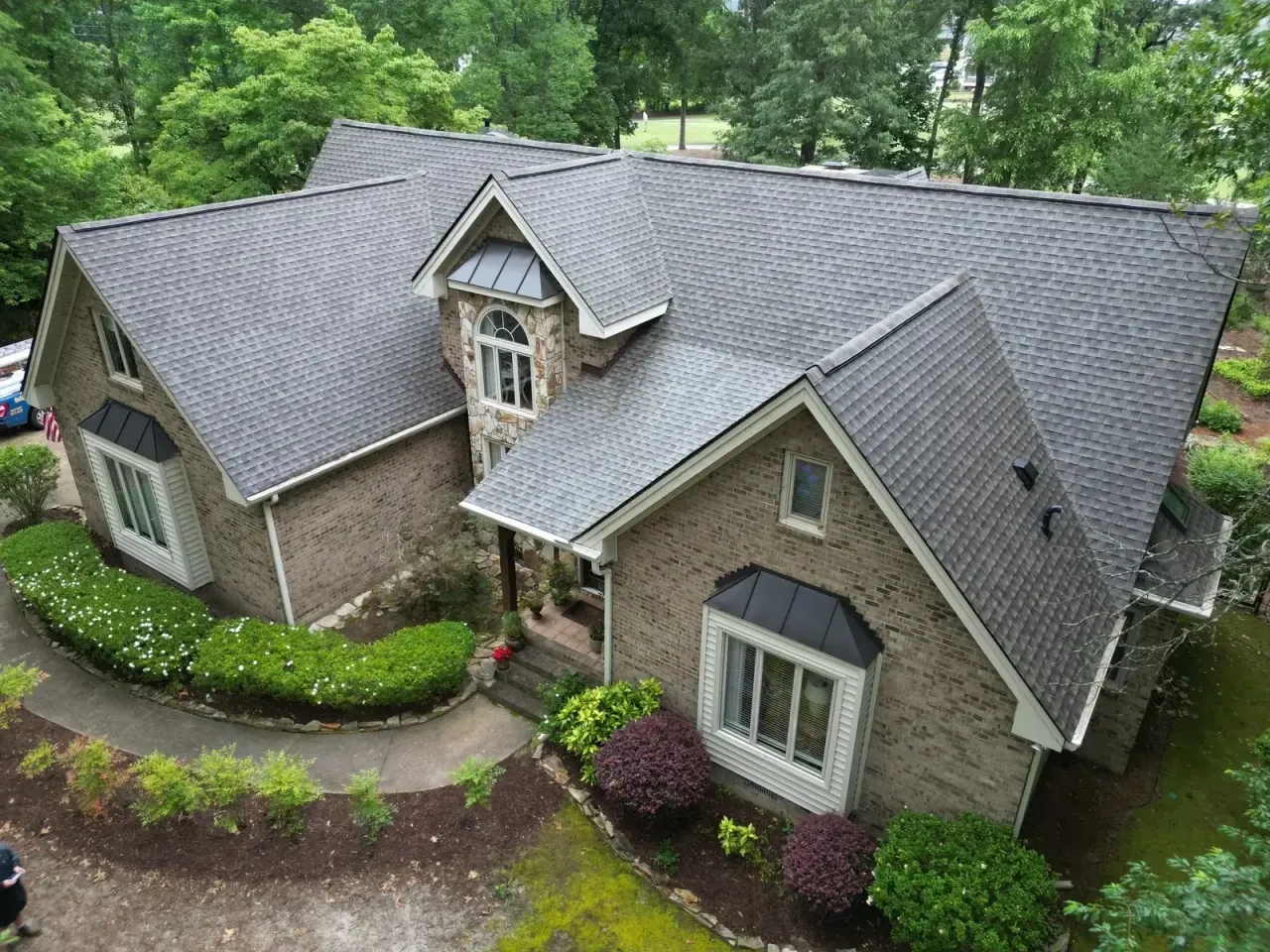 Completed roof replacement with Weathered Wood GAF Timberline HDZ shingles on Birkdale Ct in Fuquay-Varina, NC
