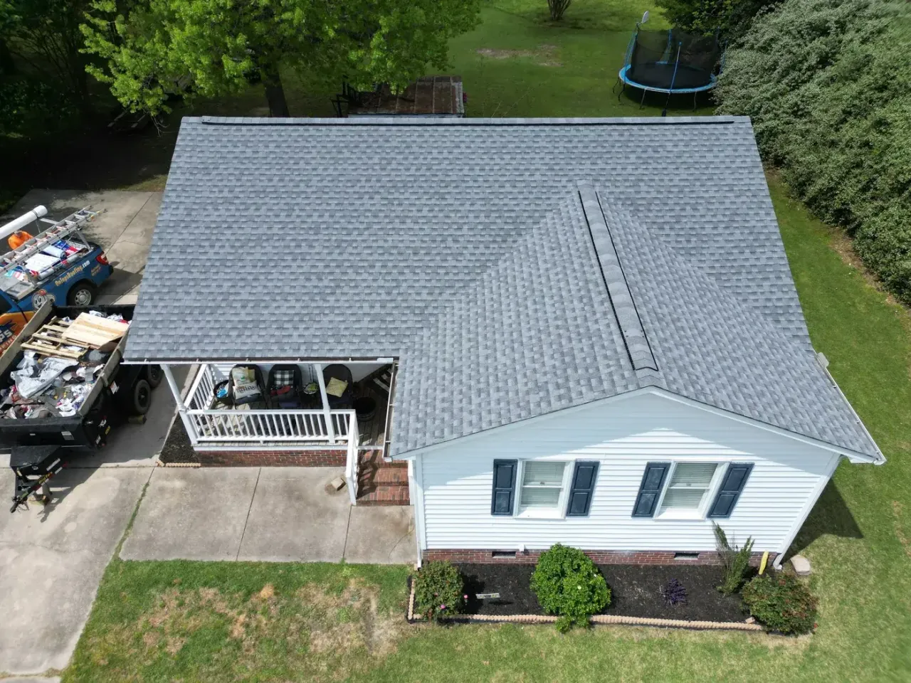 Completed roof replacement with Oyster Grey GAF Timberline HDZ shingles on Chinaberry Ln in Angier, NC