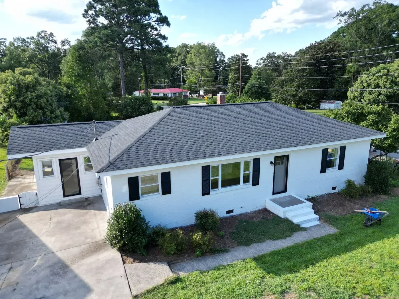 Completed roof replacement on a Durham home on Duke Homestead Rd with new GAF architectural shingles
