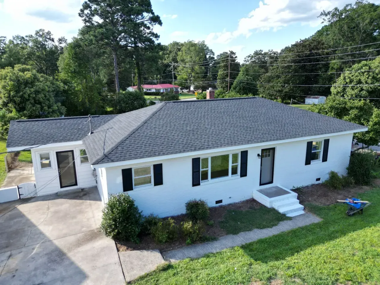 Completed roof replacement with Charcoal GAF Timberline HDZ shingles on Duke Homestead Rd in Durham, NC