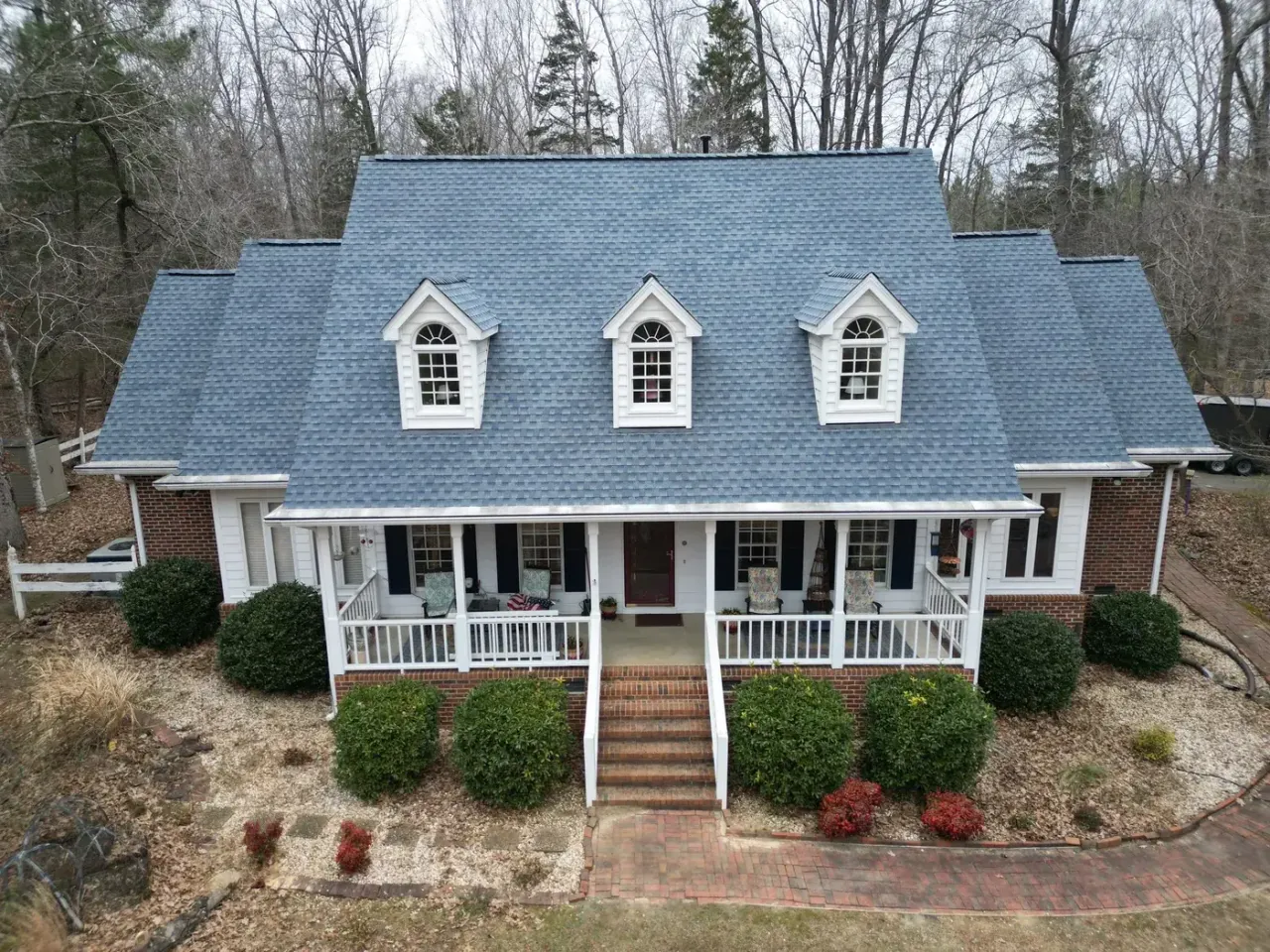 Completed roof replacement with Biscayne Blue GAF Timberline HDZ shingles on Ericka Dr in Hillsborough, NC