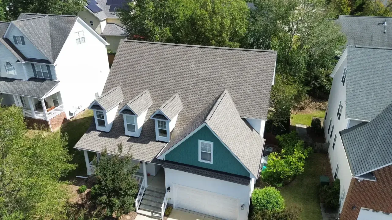 Completed roof replacement with Weathered Wood GAF Timberline HDZ shingles on Gravel Brook Ct in Cary, NC
