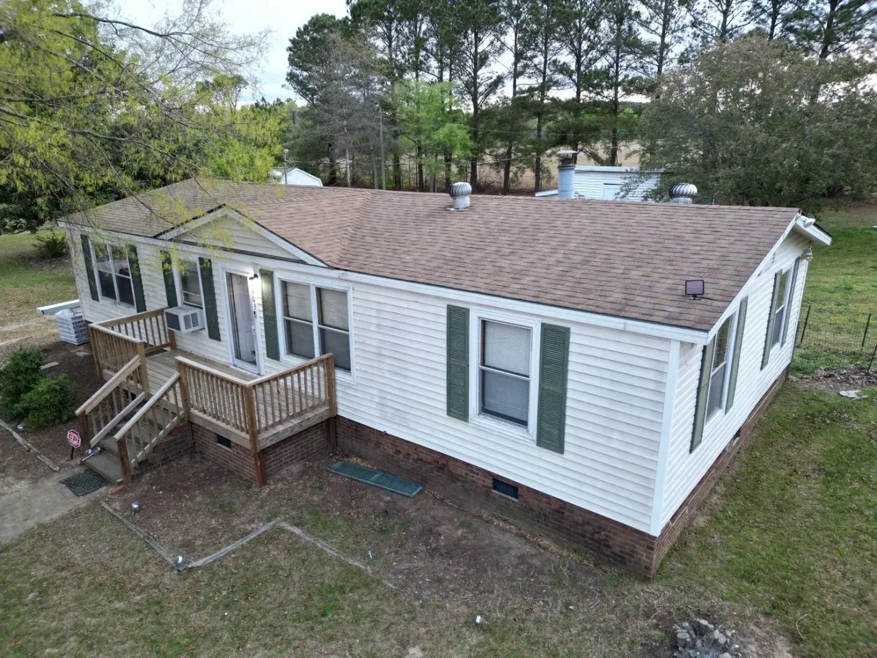 Completed roof replacement with Weathered Wood GAF Timberline HDZ shingles on Hobson Rd in Dunn, NC