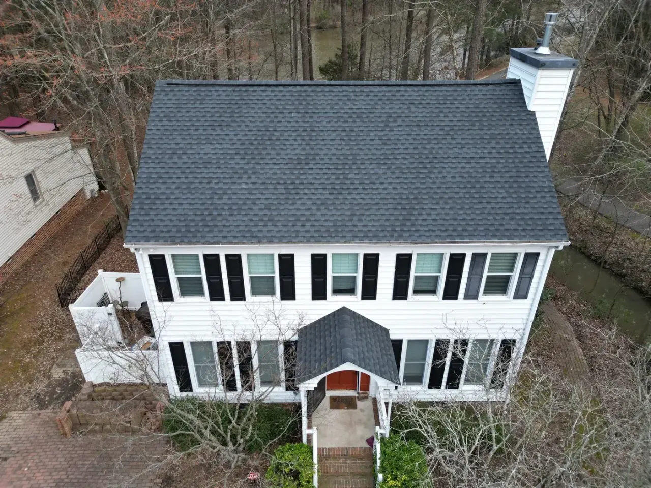 Completed roof replacement with Charcoal GAF Timberline Ultra HDZ shingles on Lakeshore Dr in Durham, NC