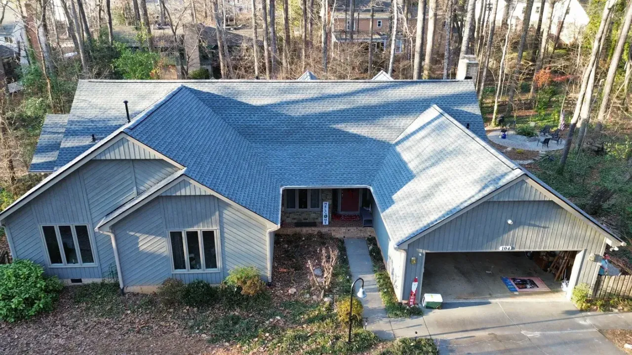 Completed roof replacement with Pewter Gray GAF Timberline HDZ shingles on Lochwood Dr in Cary, NC