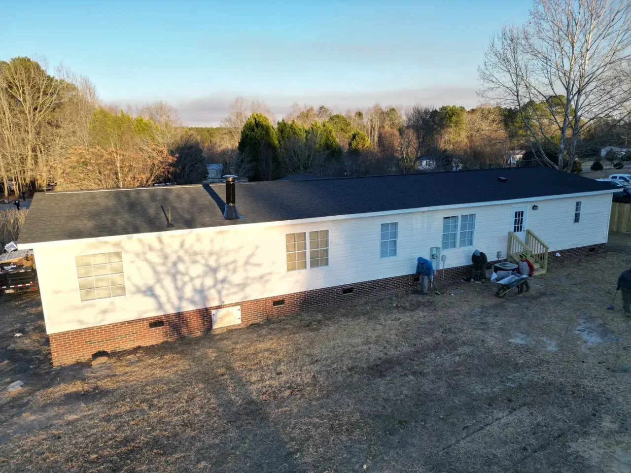 Completed roof replacement with Charcoal GAF Timberline Natural Shadow shingles on Maideline Ave in Sanford, NC