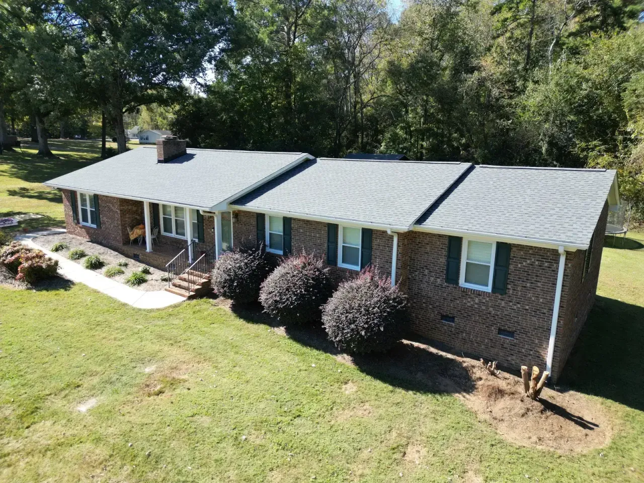 Completed roof replacement with Pewter Gray GAF Timberline HDZ shingles on Middleton Rd in Garner, NC