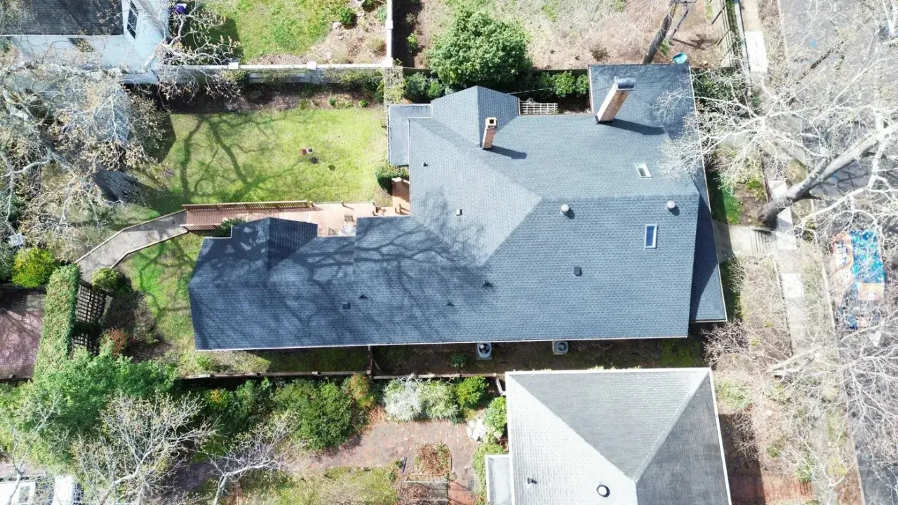 Completed roof replacement with Charcoal GAF Timberline HDZ shingles on Park Dr in Raleigh, NC
