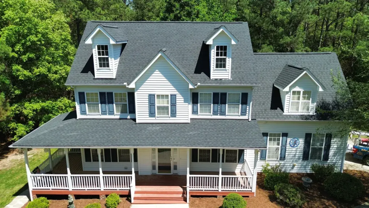 Completed roof replacement with Charcoal GAF Timberline Natural Shadow shingles on Poplar Forest Ln in Pittsboro, NC