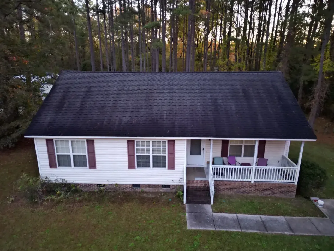 Roof on Rock Pillar Rd in Clayton, NC before the roof replacement
