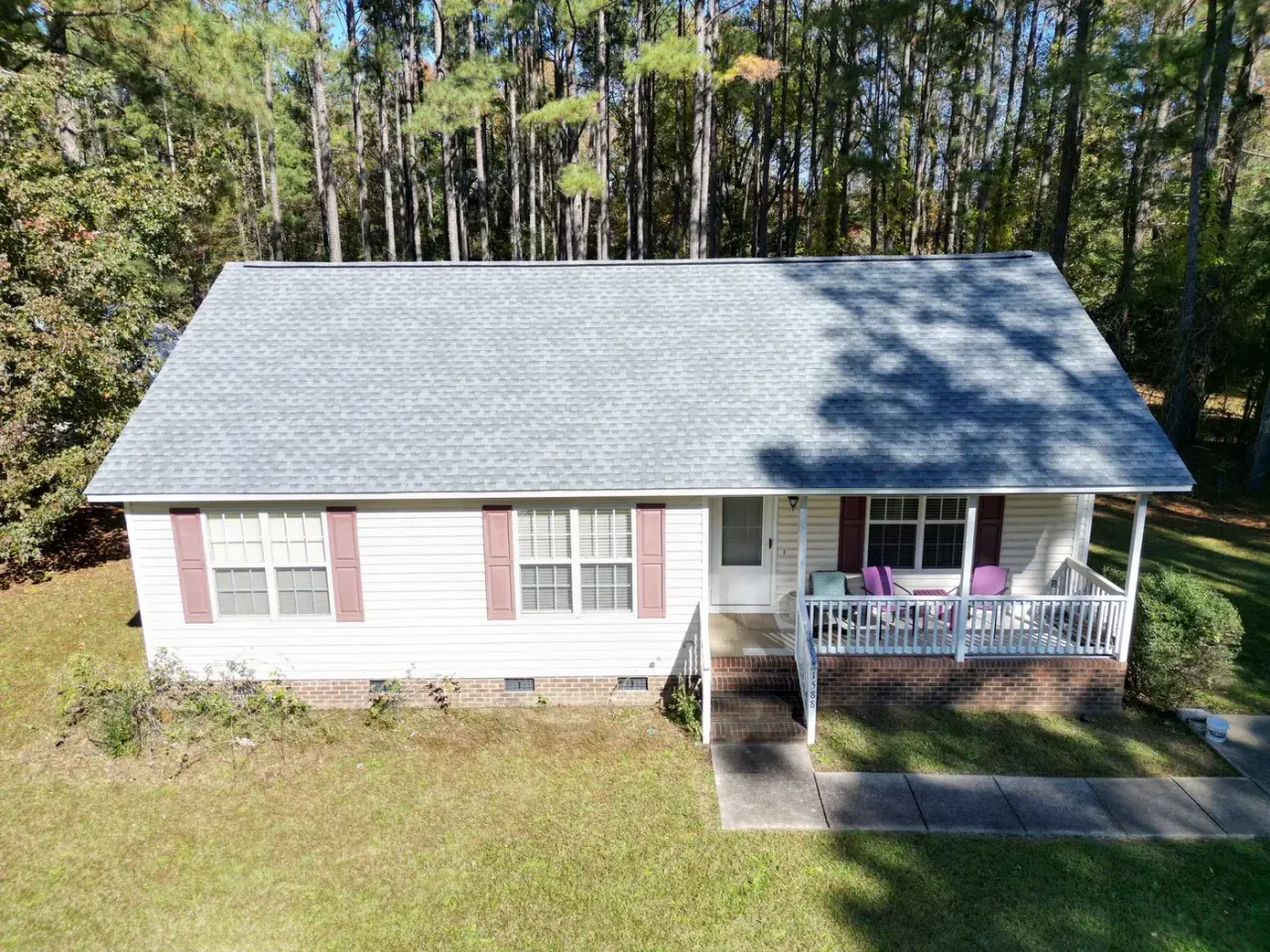 Completed roof replacement with Pewter Gray GAF Timberline HDZ shingles on Rock Pillar Rd in Clayton, NC
