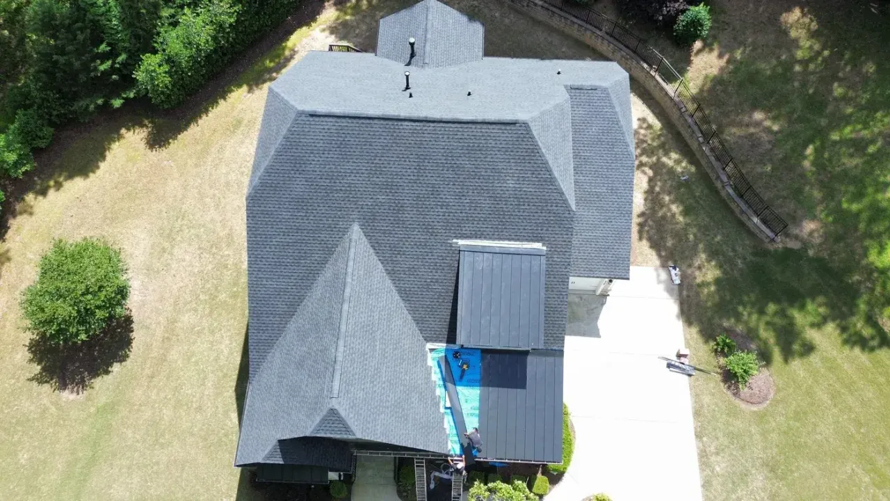 Completed roof replacement with Charcoal GAF Timberline Ultra HDZ shingles on Roller Mill Ct in Raleigh, NC