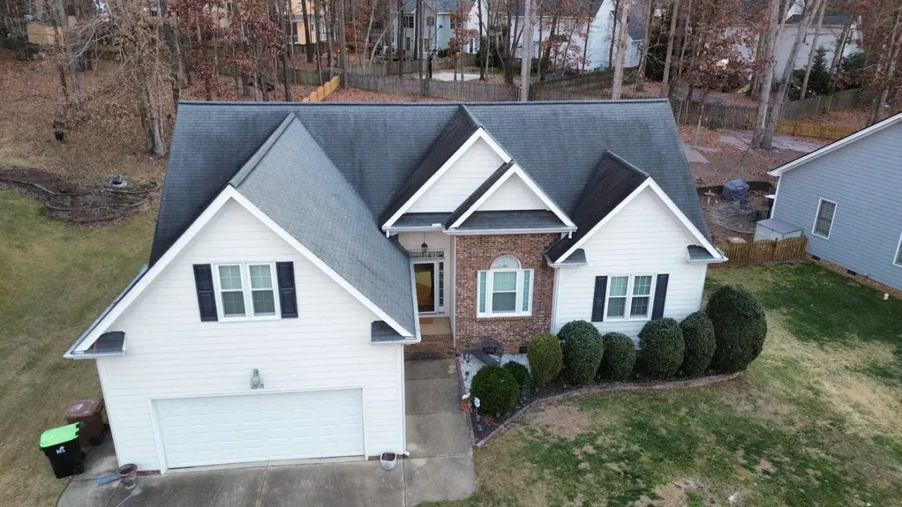 Roof replacement on Saranac Ridge Dr in Holly Springs, NC, photo 1 of 11