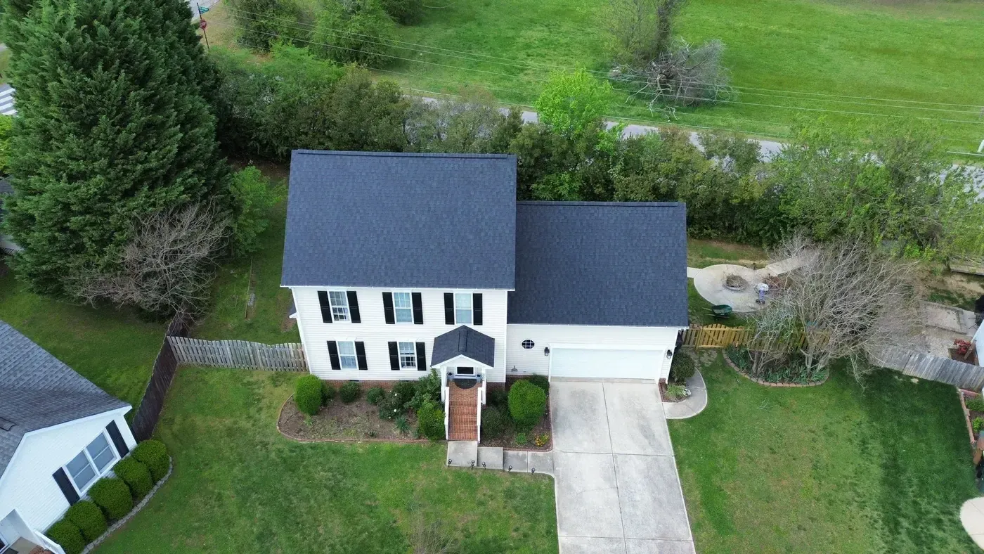 Completed roof replacement on a home on Springside Dr in Holly Springs