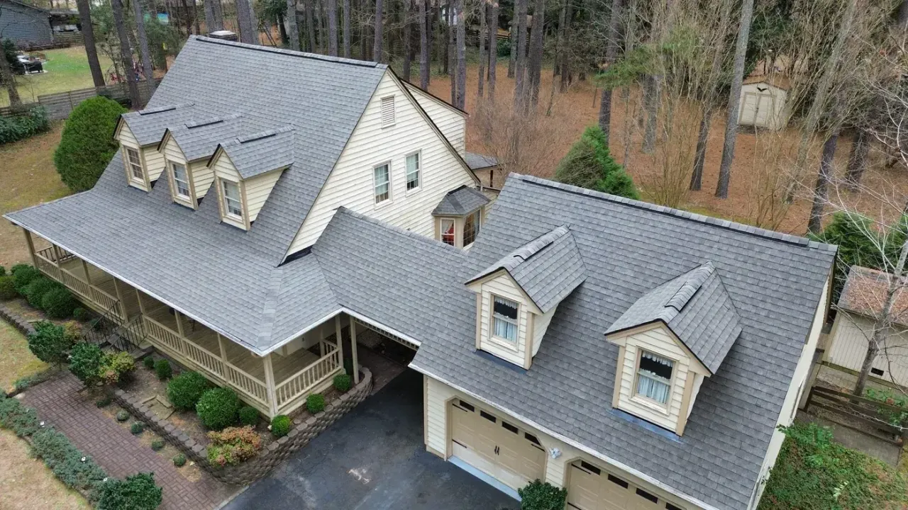 Completed roof replacement with Charcoal GAF Timberline Natural Shadow shingles on The Dyke Drive in Raleigh, NC
