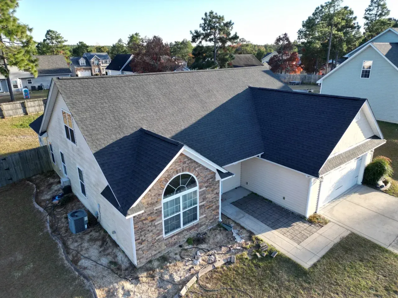 Completed roof replacement with Charcoal GAF Timberline Natural Shadow shingles on Valley Oak Dr in Dunn, NC