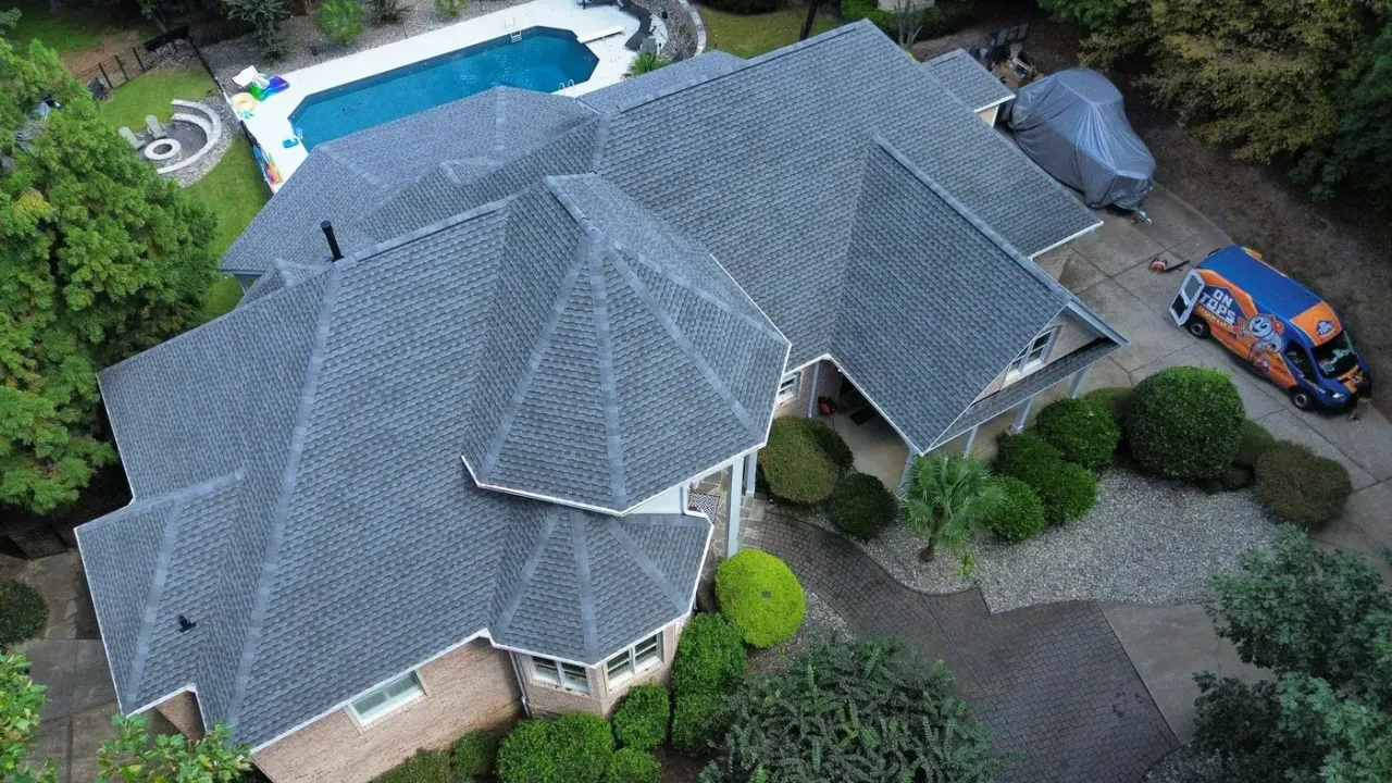 Completed roof replacement with Pewter Gray GAF Timberline Ultra HDZ shingles on Vista Dell Lago Ln in Wake Forest, NC