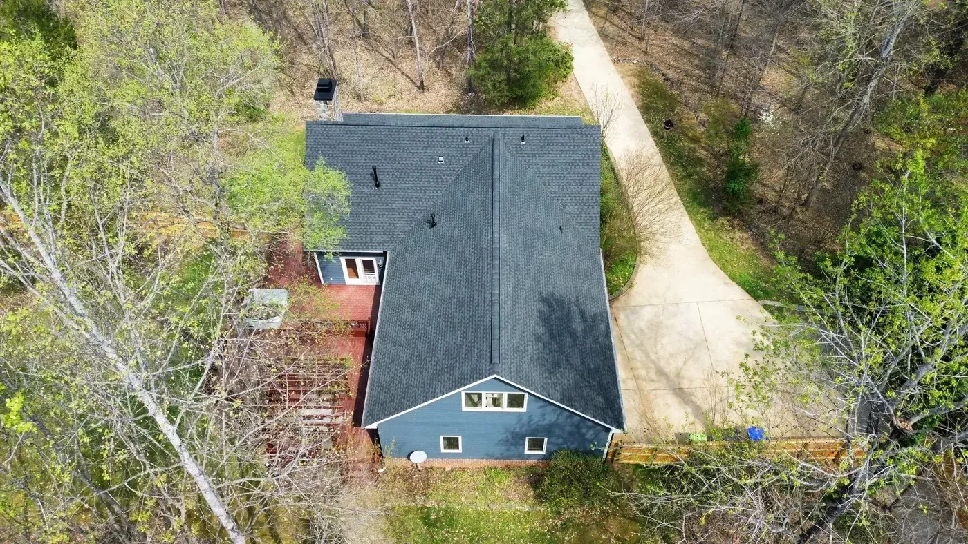 Completed roof replacement on a Wake Forest home on Wolverton Fields Dr with new GAF Timberline Ultra HDZ Charcoal architectural shingles